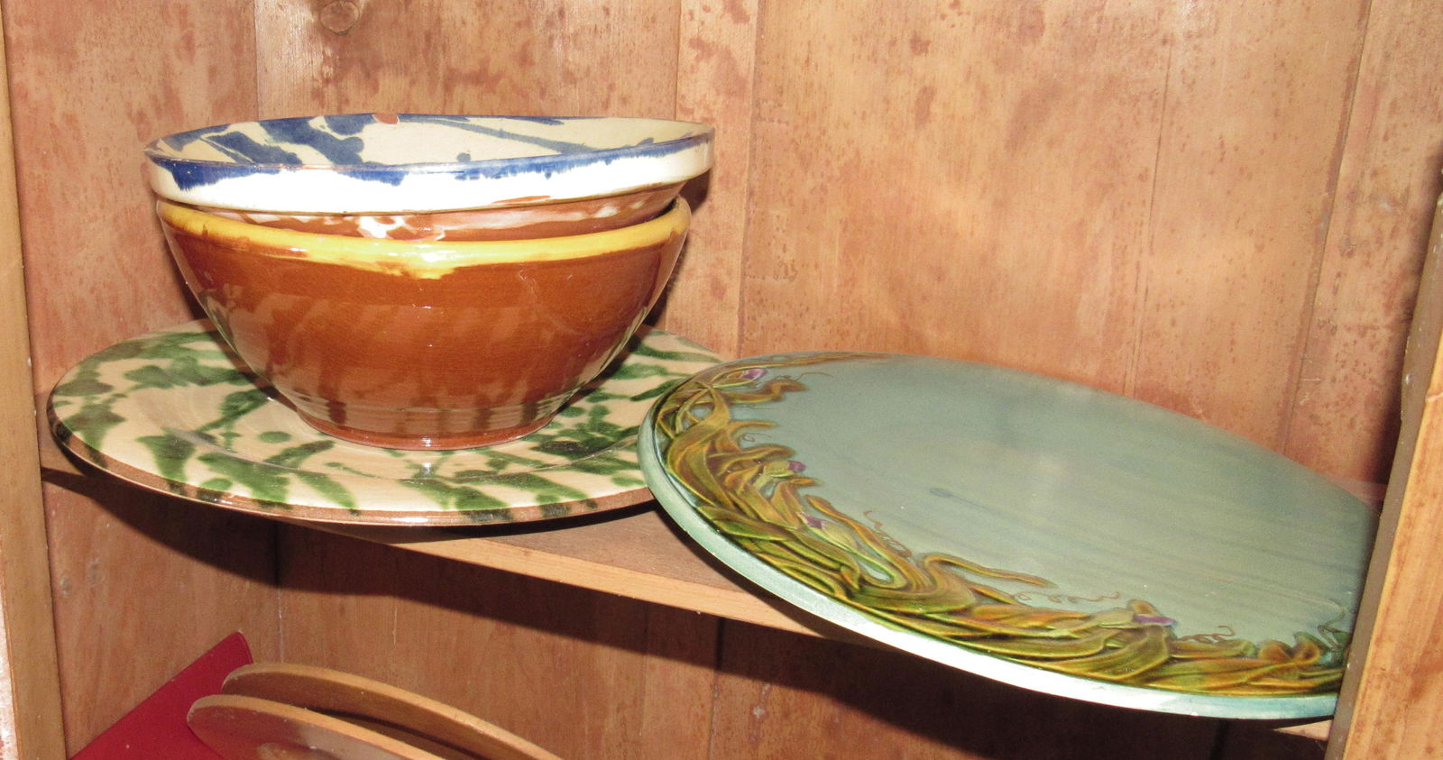 Redware Platter and Bowls: Blue platter on left is not redware