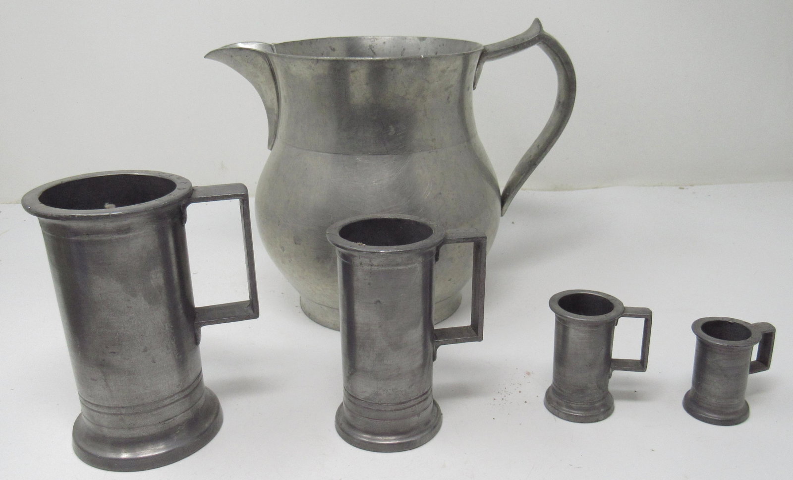 Pewter Measurers & Steiff Pitcher: Pitcher is approx 6 1/4" tall
