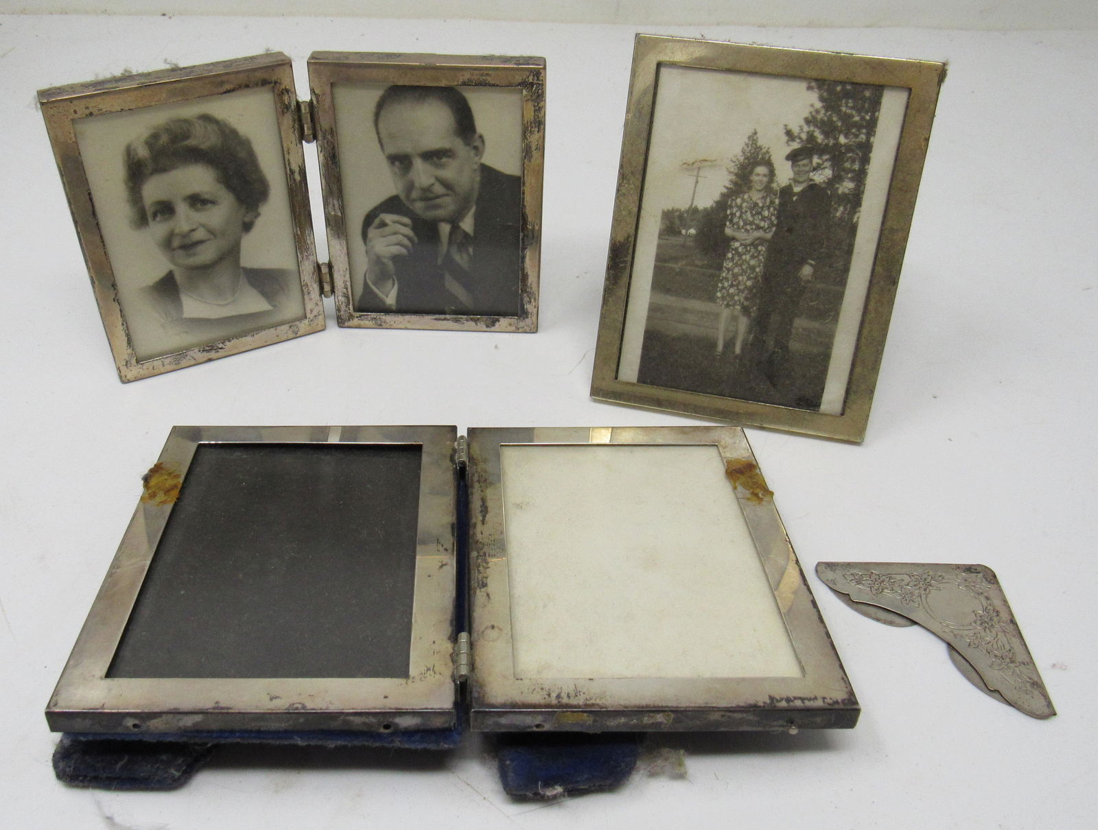 Carr Carft Web Sterling Silver Picture Frames: The frame in front is marked Sterling Silver by Alice ????. Picture frame back left is approx 5 3/4" x 3 3/4"