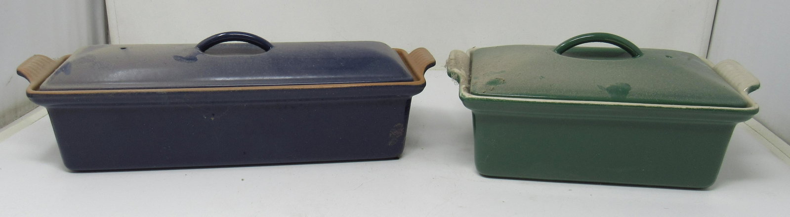 Le Creuset Cast Iron Enameled Casseroles: Blue one is approx 4 1/4" x 14" x 4 1/2" tall. Green one is not marked