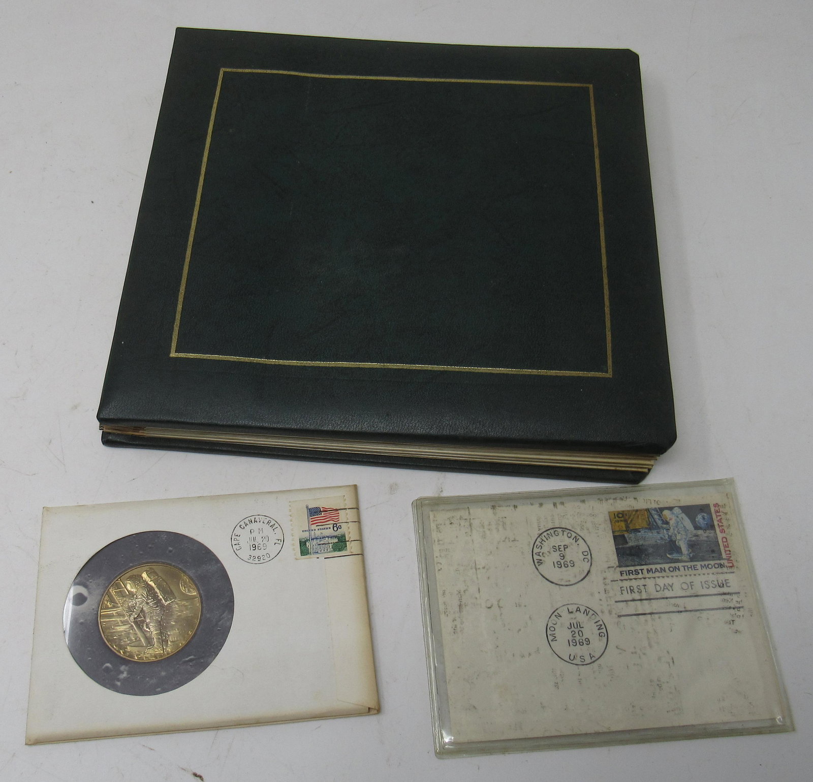 1969 Moon Landing Photos Medallion First Day Issue: Photo Album, medal , and first day issue stamp