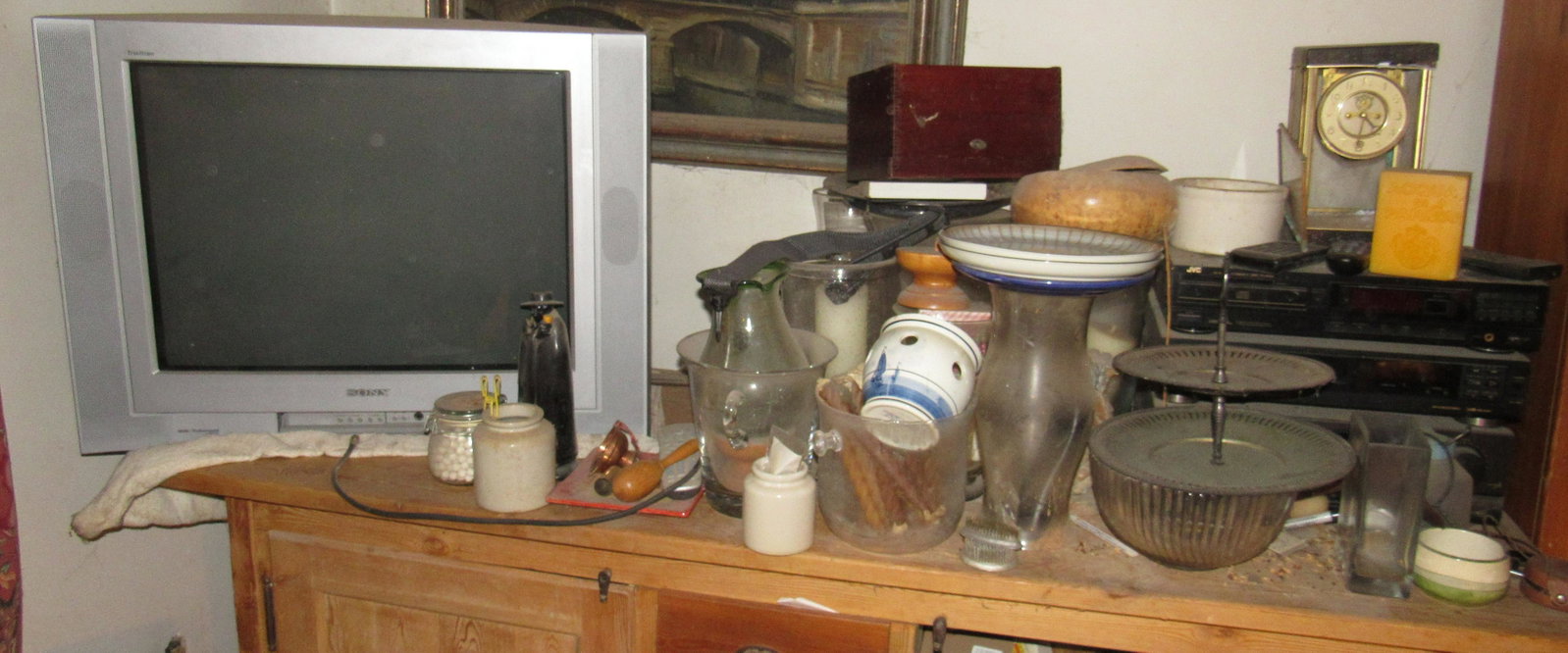 Contents of Cabinet: Lot includes everything in and on cabinet ( including 2 speakers on floor). DOES NOT INCLUDE PAINTING ON WALL. Take what you want and leave the rest. Items must be picked up before noon. NO EXCEPTIONS