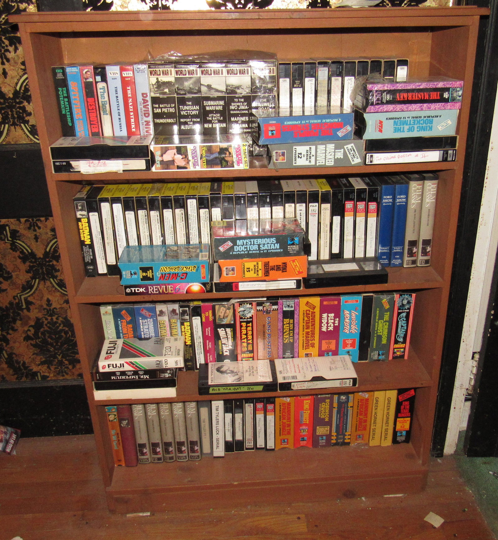 Bookshelf with VHS Tapes: Shelf is approx 9". X 34" x 47" tall