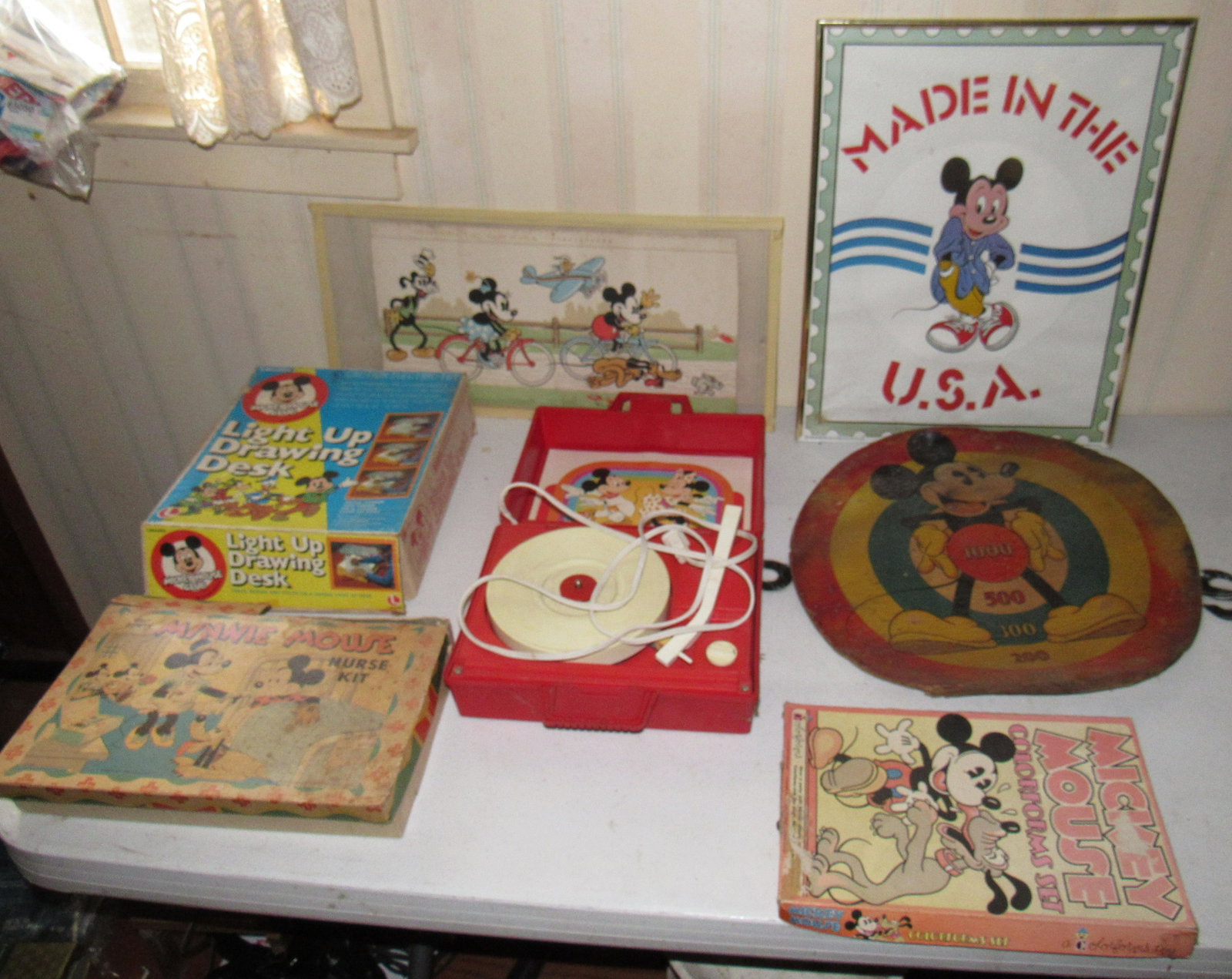 Misc Mickey Mouse Collectibles: Getting all picture on table.