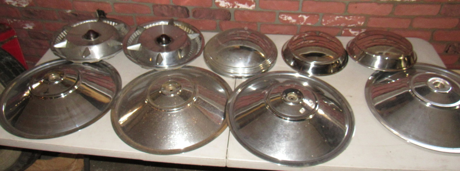 Hubcaps Center Caps: Getting all pictured on table.