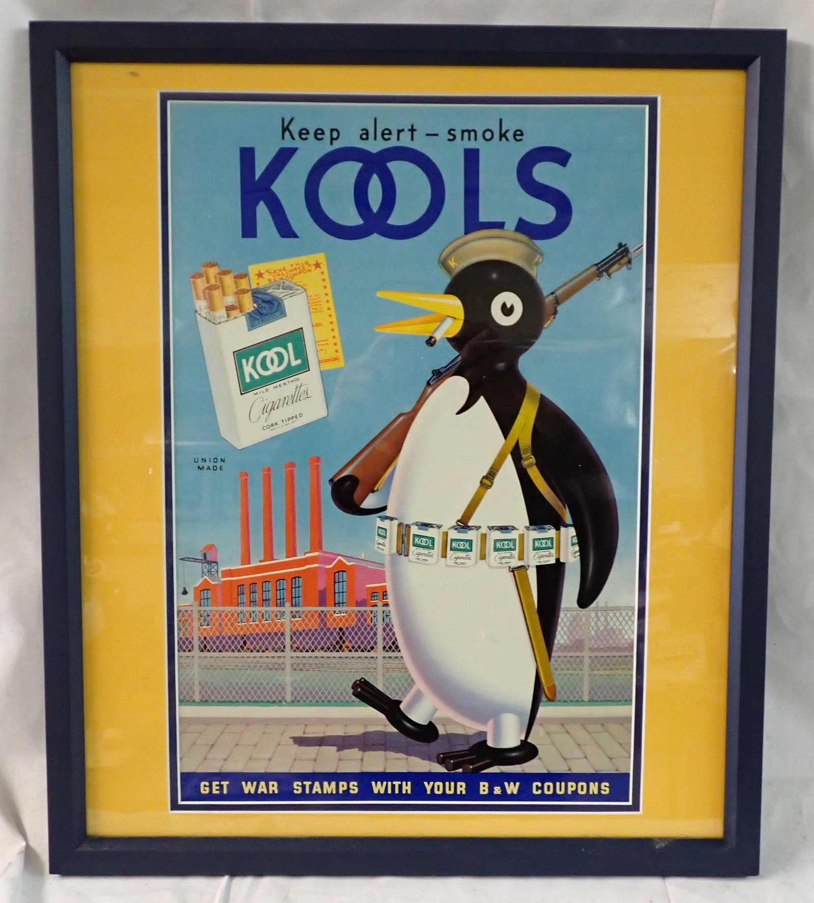 Kool Cigarette Sign War Stamps & Penguin with Gun: framed. Approx 18 1/2" x 21 1/2"