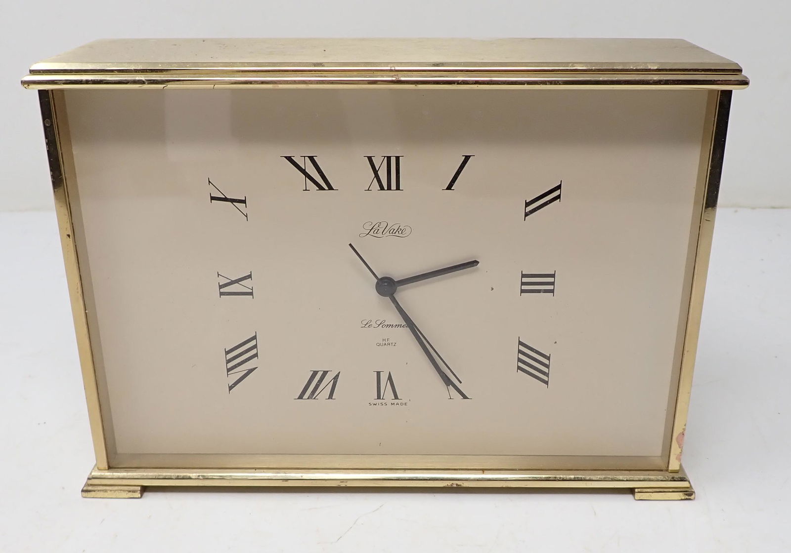 La Vake Le Lommel Brass Clock: Approx 2 1/2" x 7 7/8" x 5 1/2" tall