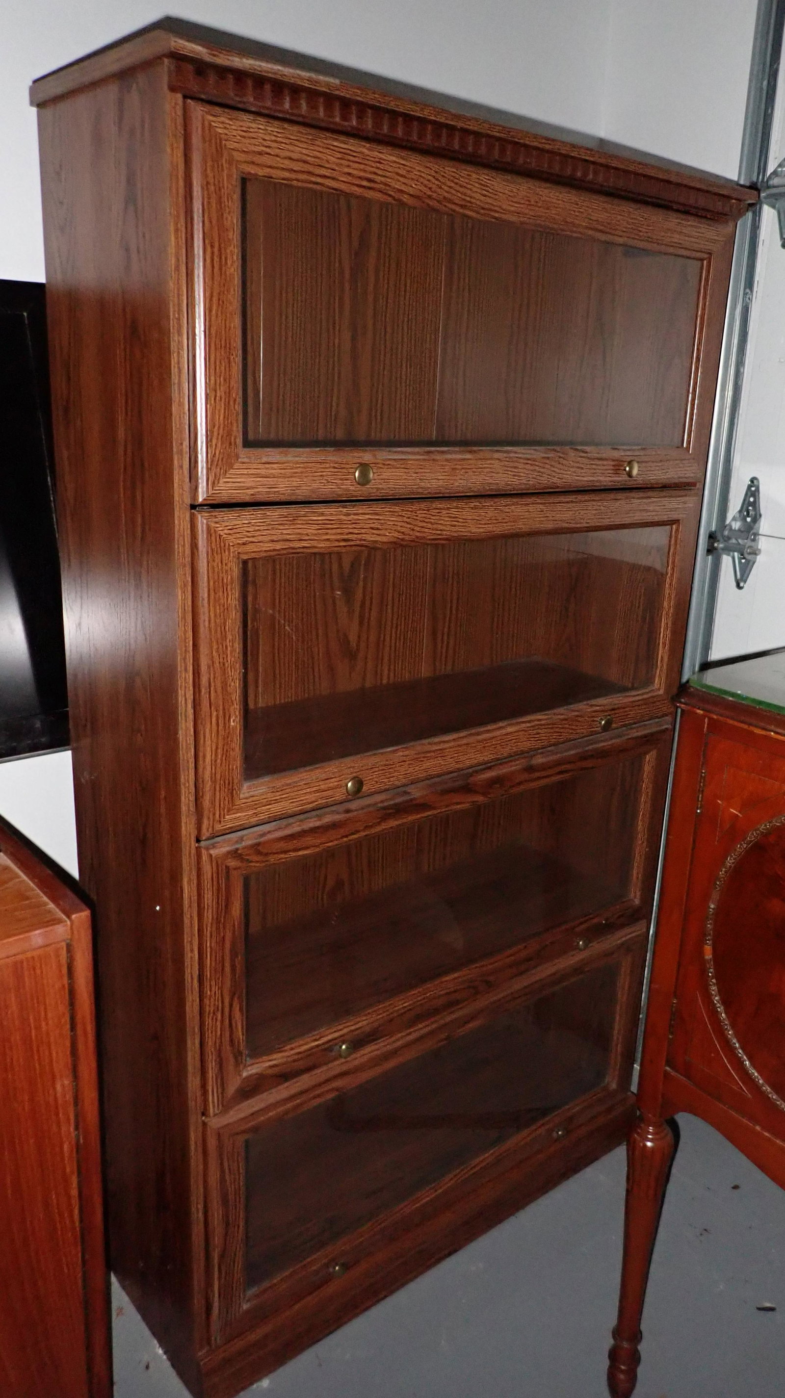 Bookcase: Apprx 13" x 34" x 61" tall. Made of particle board