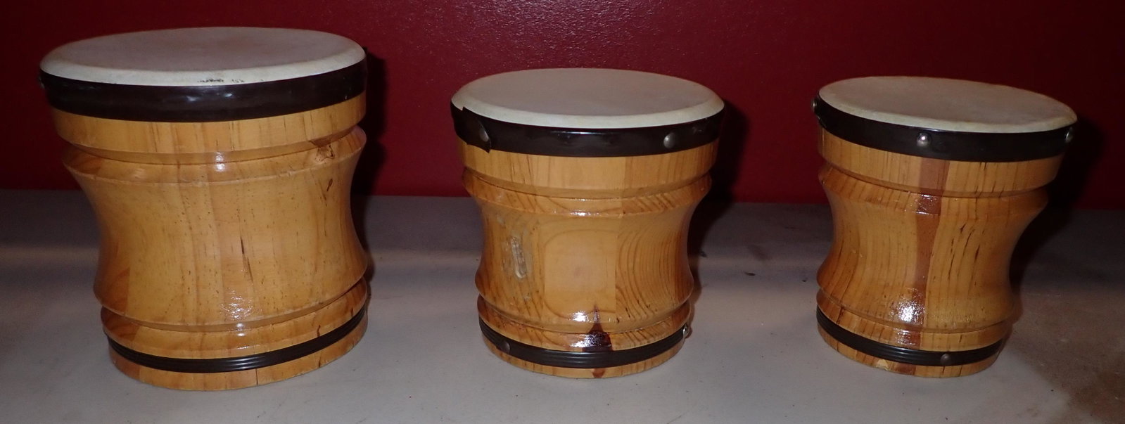 Bongo Drums: Largest is approx 6" in diameter and 6 1/2" tall.
