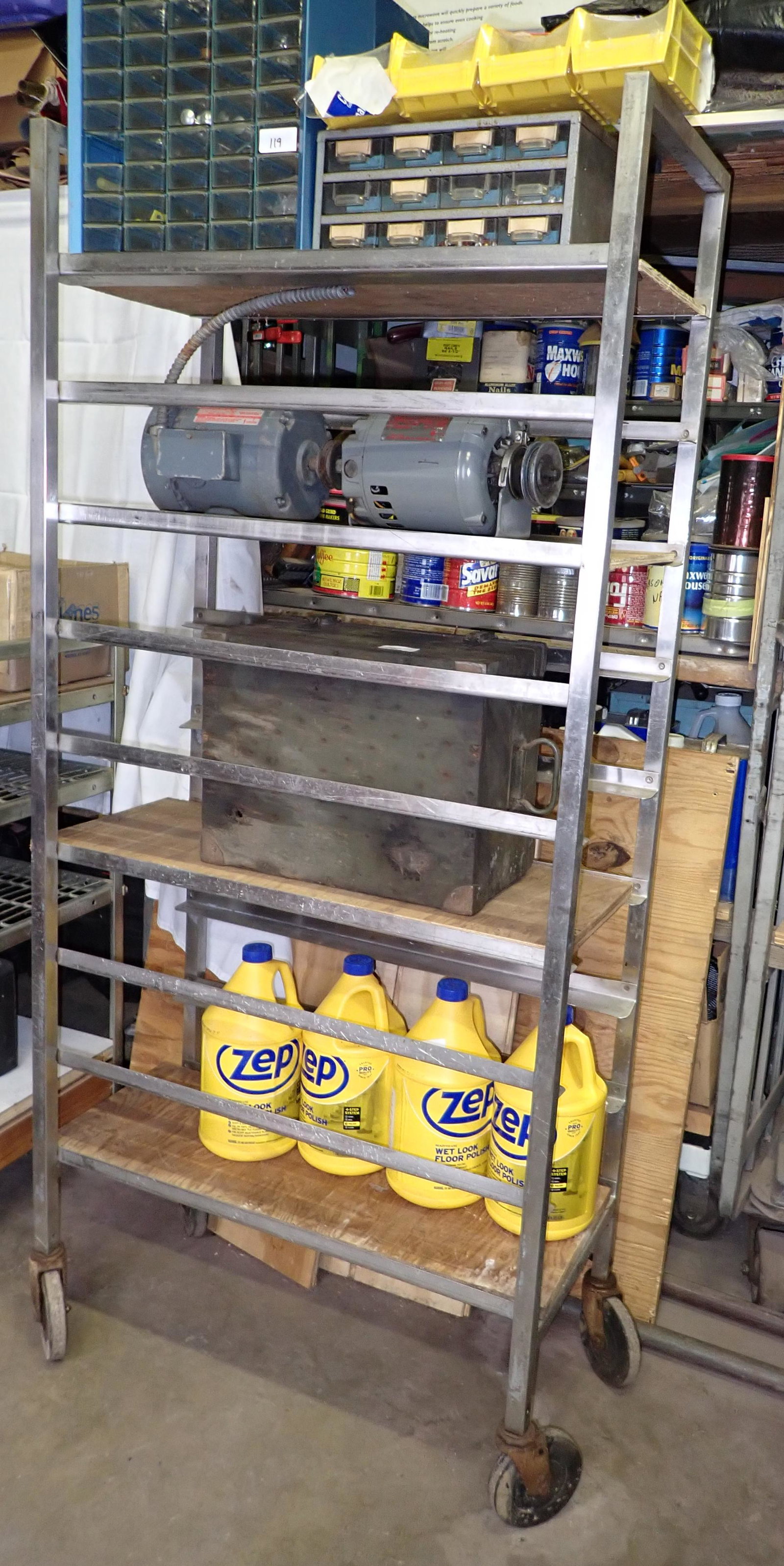 Stainless Rolling Bakery Cart: Approx 15" x 30" x 66" tall. DOES NOT INCLUDE ITEMS ON IT. PICK UP IN AFTERNOON ONLY !