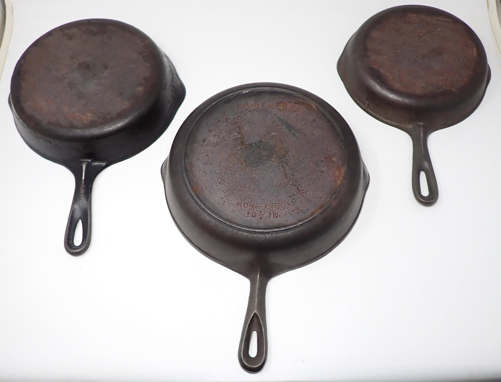 Wagnerware Cast Iron Skillets: Largest in center is 10 1/4" and is NOT Wagner