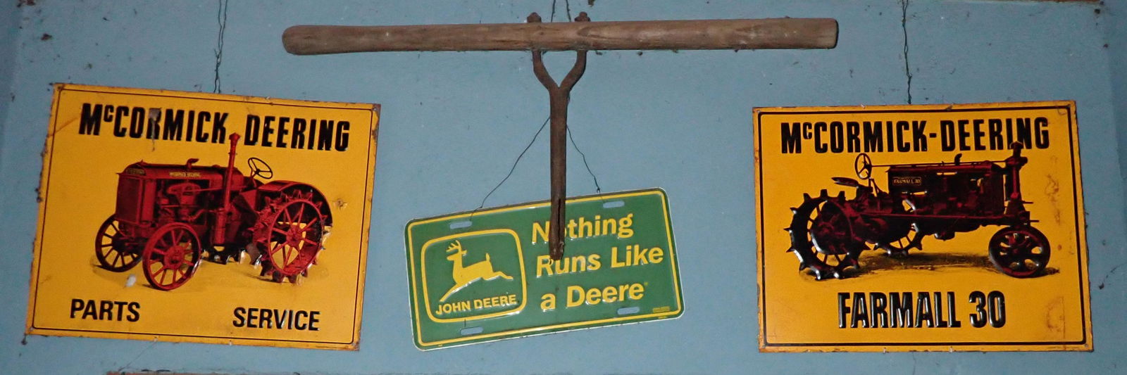 McCormick Deering Farmall John Deere Plate: Getting both signs, John Deere License plate and hay hook.