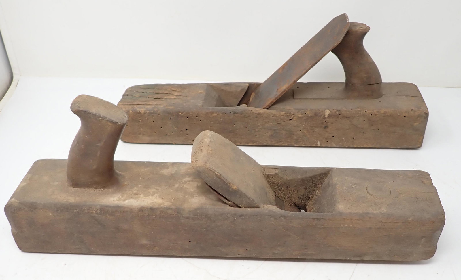 2 Wooden Planes: One in front is approx 2 7/8" x 16 1/4" x 2 7/8" tall