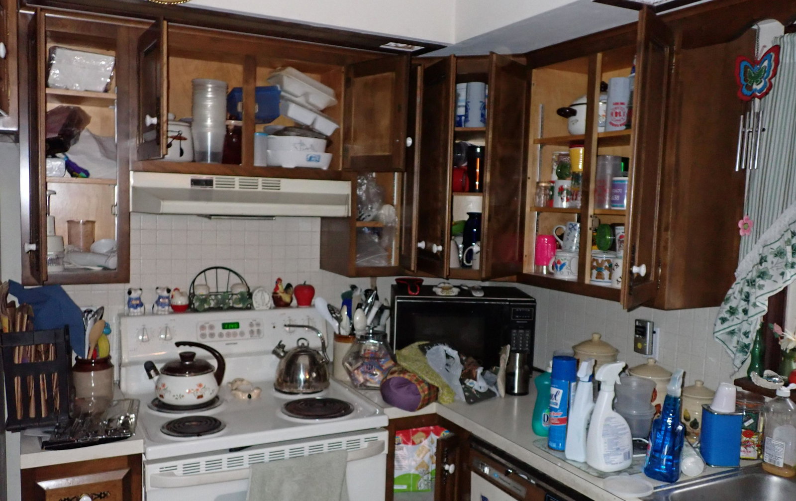 Partial Kitchen Contents: Lot includes everything on counter and in cabinets. Take what you want and leave the rest. Does not include anything hanging on walls