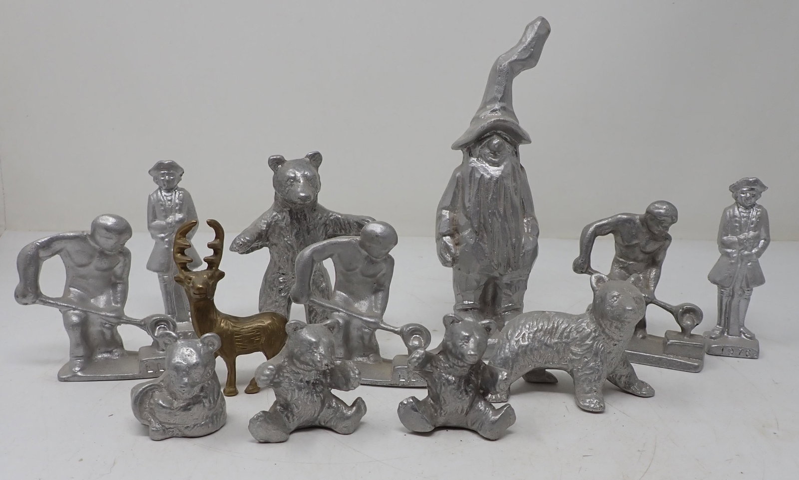 Aluminum Figures: Includes brass deer. Tallest is apprx 6 1/2" tall