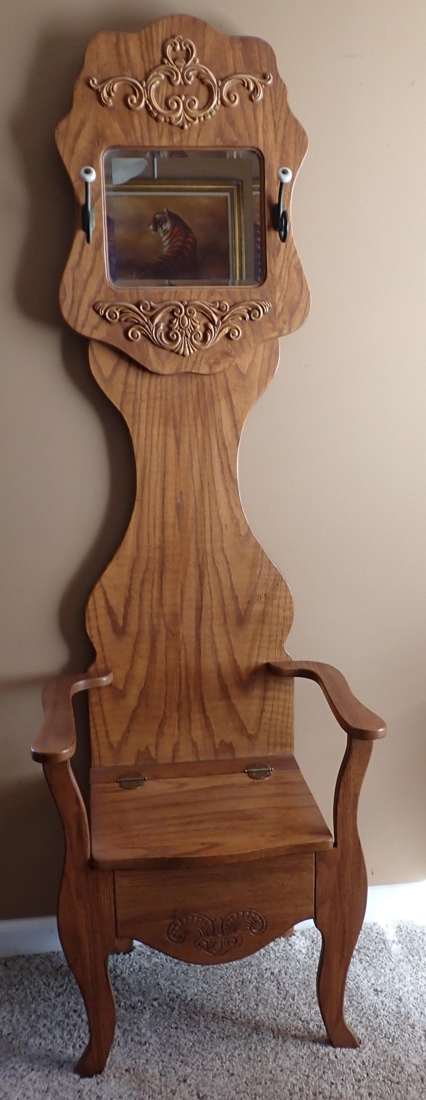 Hall Rack: Approx 24:" wide, 16" from front to front of back, 17 1/4" to seat, and 73" tall. Has beveled mirror