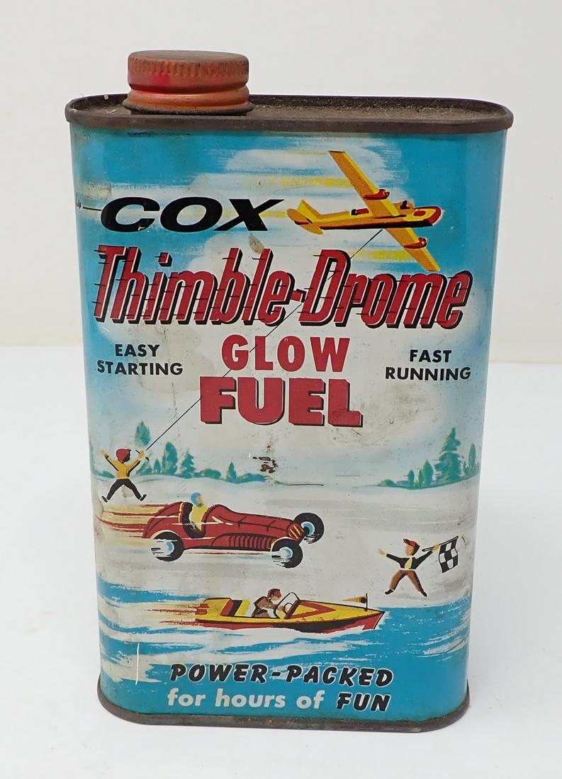 Cox Thimble Drome Glow Fuel: Approx 1 3/4" x 3 3/4" x 6" tall. Has liquid inside. NO SHIPPING