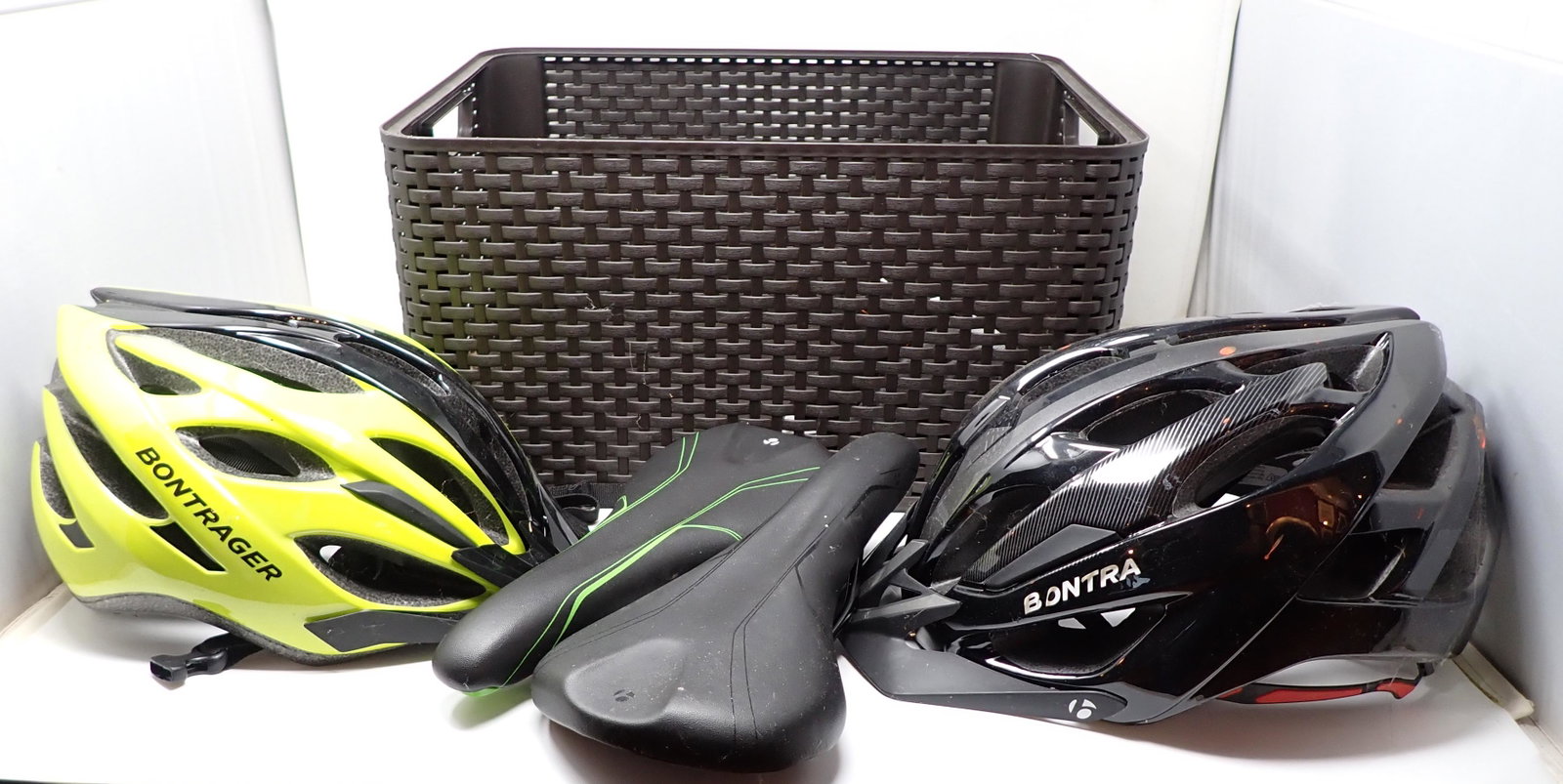 Bontrager Bike Helmets Mirror: Also includes plastic crate. Helmet on left is medium/large and helmet on right is XL