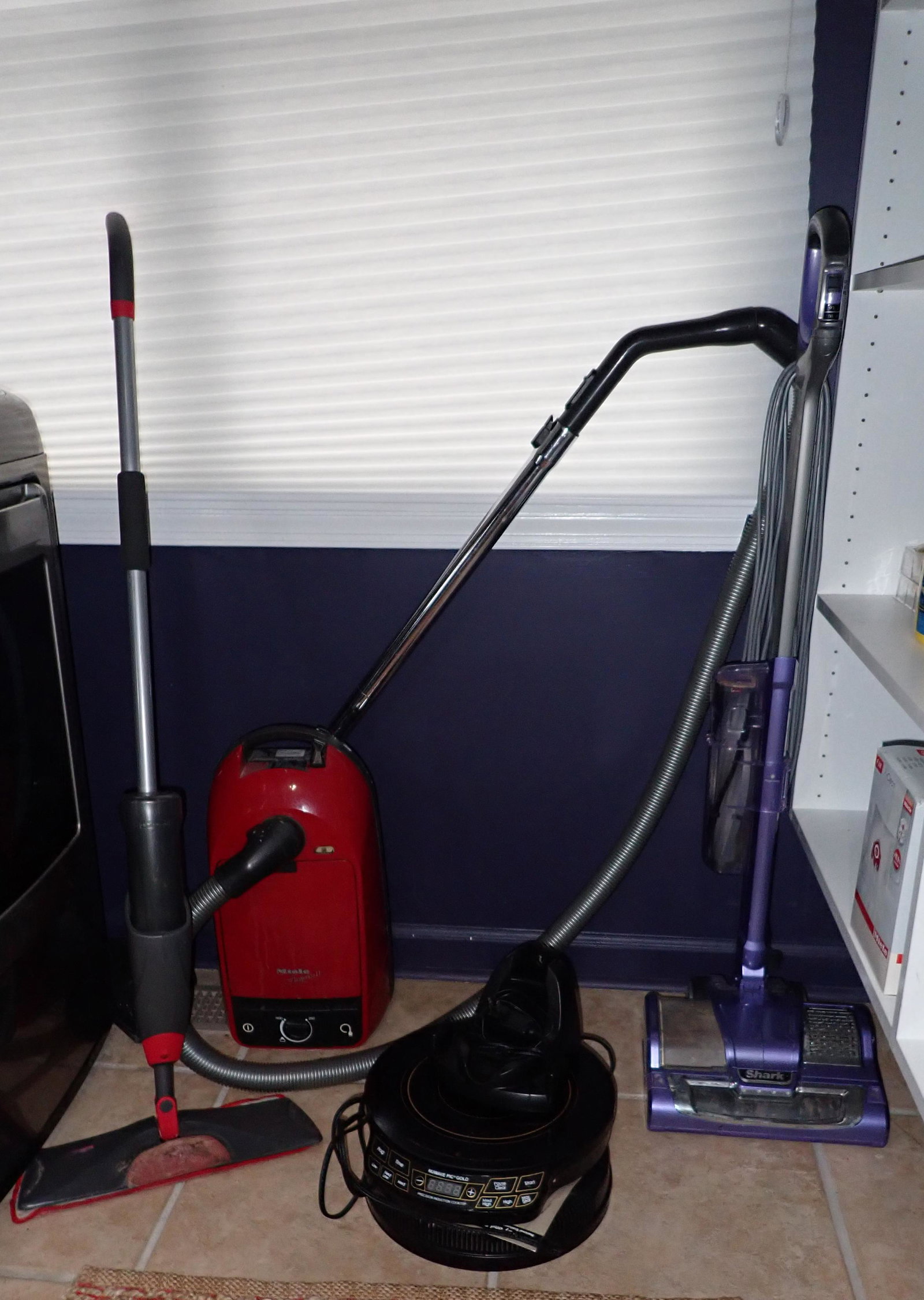 Miele Flamenco II Shark Vacuums: Getting all pictured on floor.