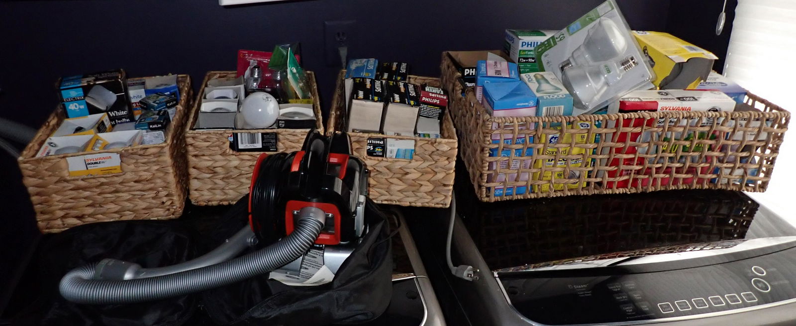 Lightbulbs and Dustbuster: Getting all pictured on top of washer and dryer.