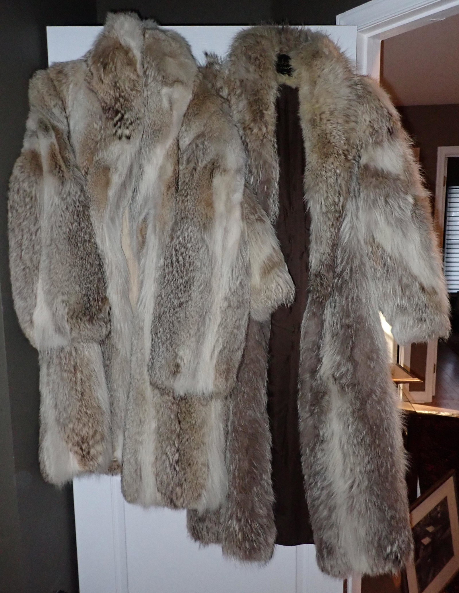 2 Stephen's Furs Coats: One on right is approx 19" pit to pit and 57 1/2" long. Left is apprx 19" pit to pit and 49" long