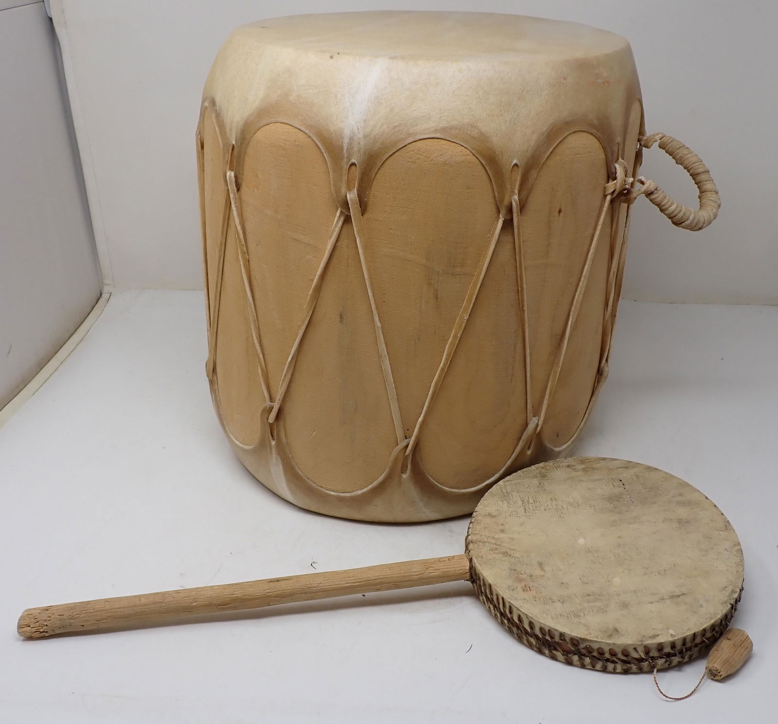 Tribal Drum and Instrument: Drum is apprx 11 1/4" in diameter and 12" tall