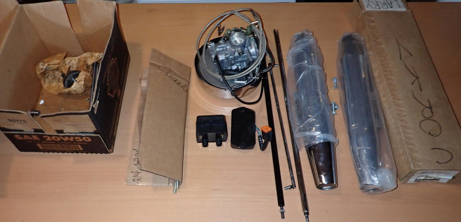 Harley Davidson Motorcycle Parts: Do not guarantee all parts are for Harley. The pipes are in a Drag Specialties Box