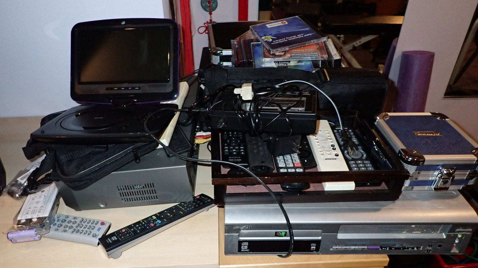DVD VHS Player Cd's Discs Misc: Lot includes all pictured on cabinet. Does not include anything in background on wall. Must pick up before noon
