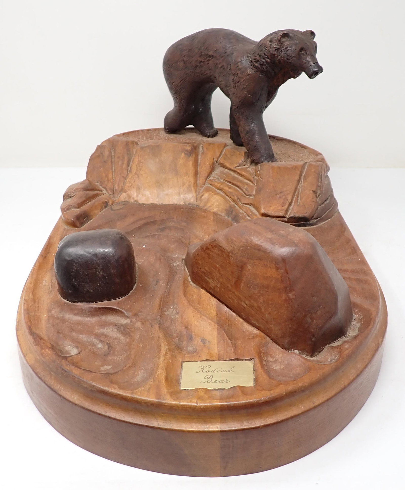 Christian Scherer Kodiak Alaskan Brown Bear Carving: Kodial Bear carved out of black Walnut. Apprx 11 1/2" x 17" x 9" tall