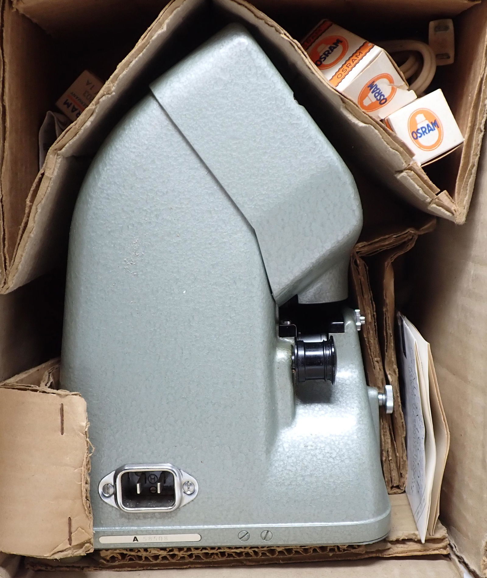 Zeiss Moviscop: In original box. Comes with what is pictured. We did not take out of the box