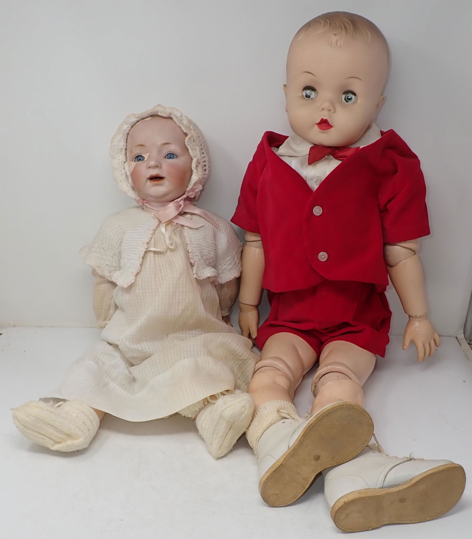 JNK Bisque Head Doll For Parts or Repair: Getting both. The one marked JNK is apprx 18". One on right has newer head on early body and is apprx 29" . All dolls in this sale are from an estate of a doll collector and repair shop. If we notice