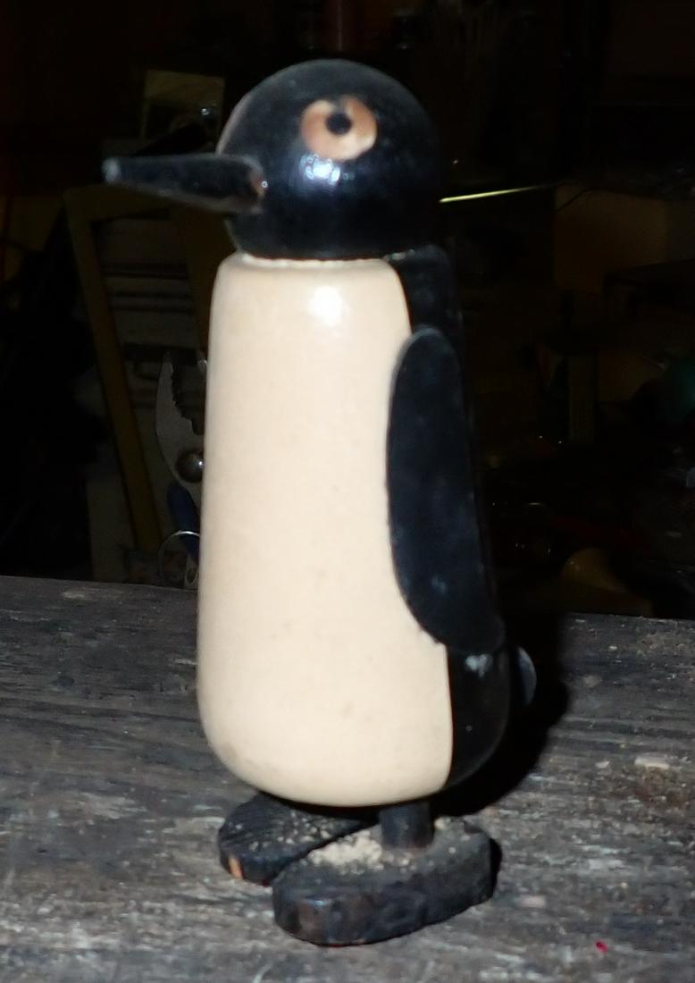 Wooden Walker Penguin: Wooden Walker type penquin is apprx 4 3/8" tall.
