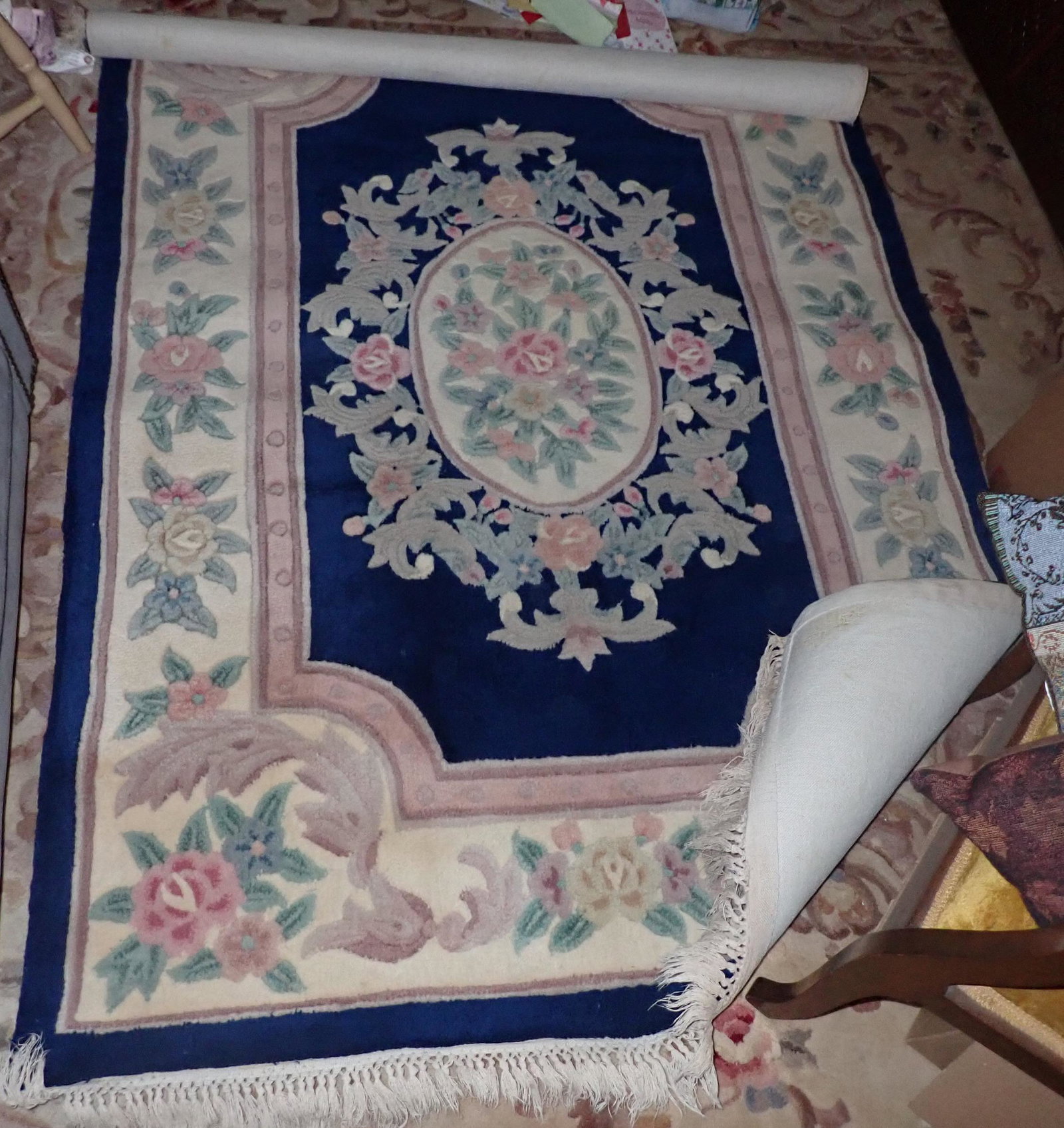 Area Rug: Approx 54"X 80" . Was wrapped in paper from cleaners. Said It had stain removed.
