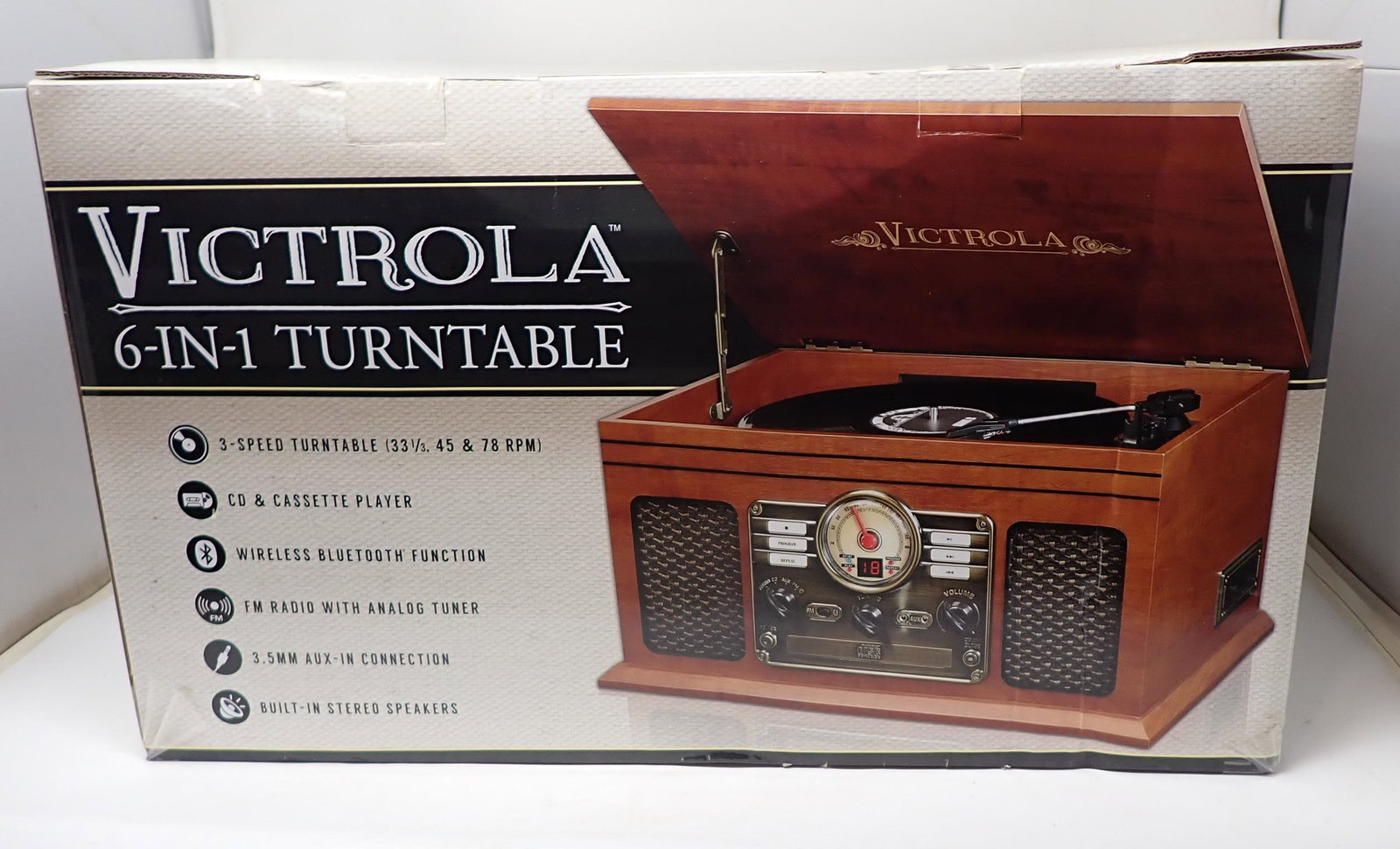 Victrola 6 in 1 Turntable: Still in original box. Not sure if it was used or not. We did not take out of the box