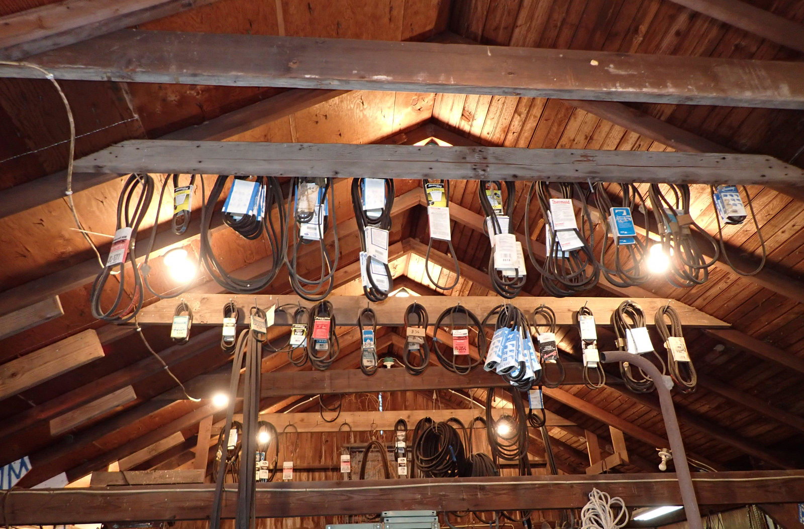 Belts: Lot is for belts only hanging from rafters. Buyer to remove. Pick up last hour of pick up day