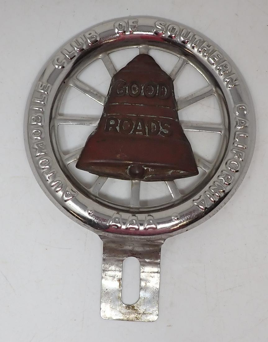 Automobile Club of Southern Ca License Plate Topper: California License plate topper with " Good Roads " Bell , is approx 3 3/4" in diameter