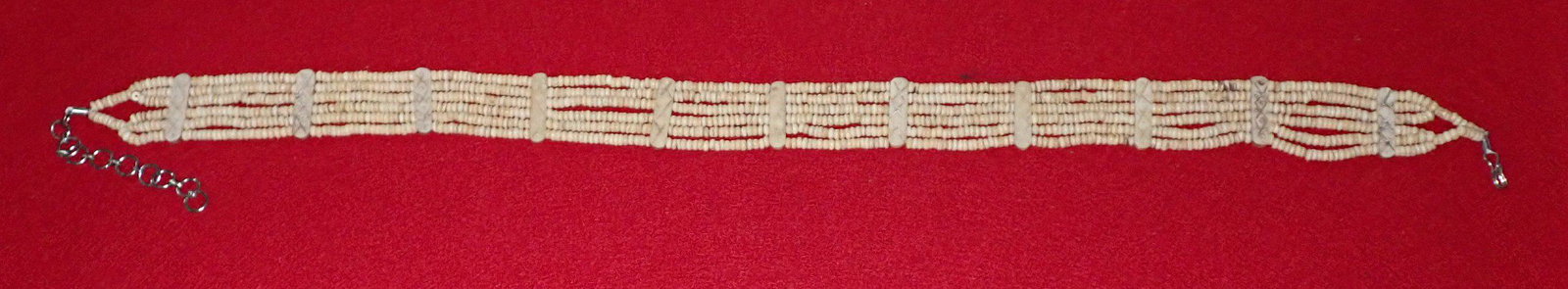 Beaded Bone Belt: Possibly Bone. Sold with no guarantees. Approx 1 1/2" wide and 33" total length