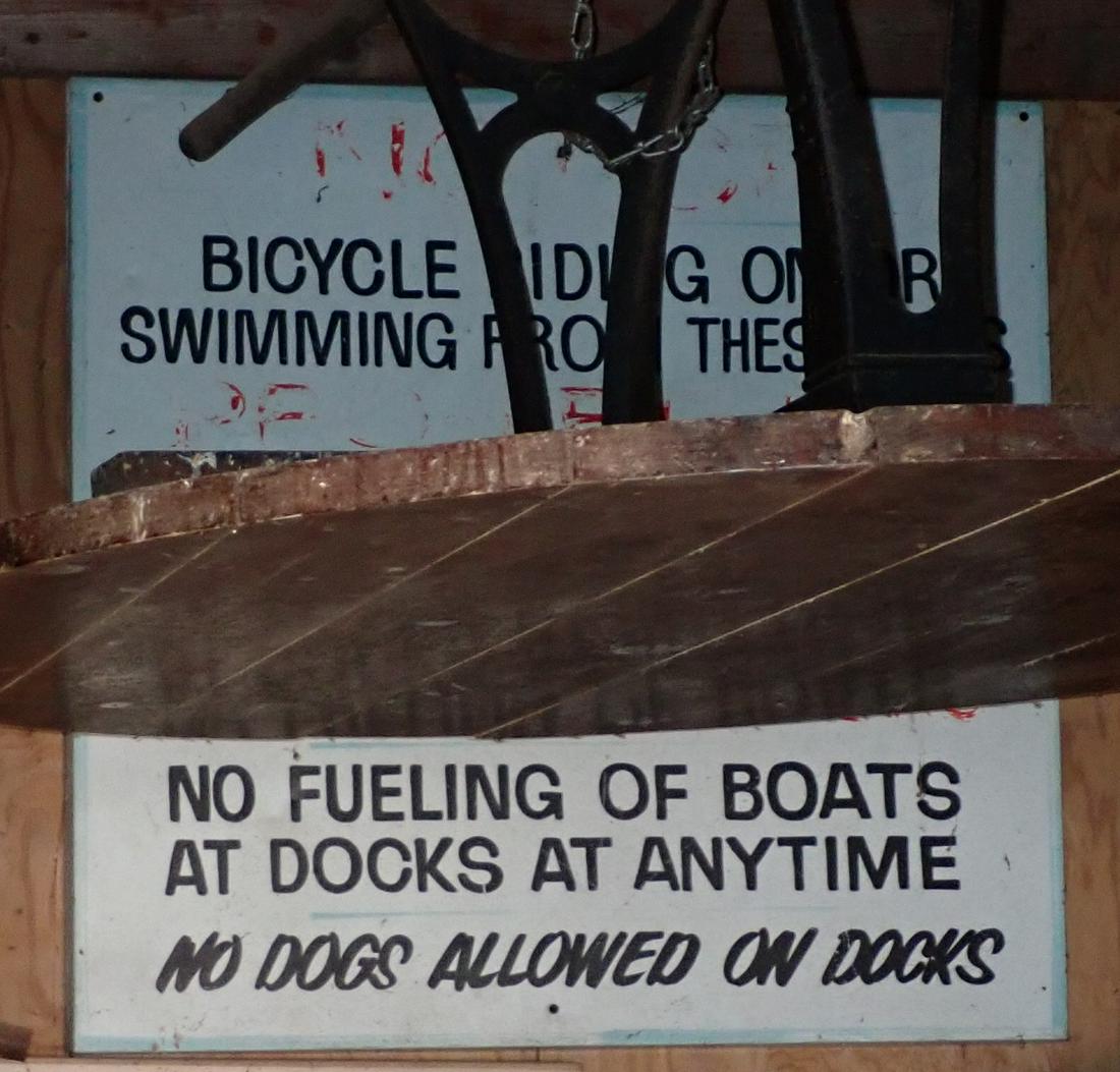 Tin Boat Dock Sign: Approx 31" x 30" . It is nailed to wall, so it might get a slight crease trying to take it off. Pick up between 3:30 and 4:30 only