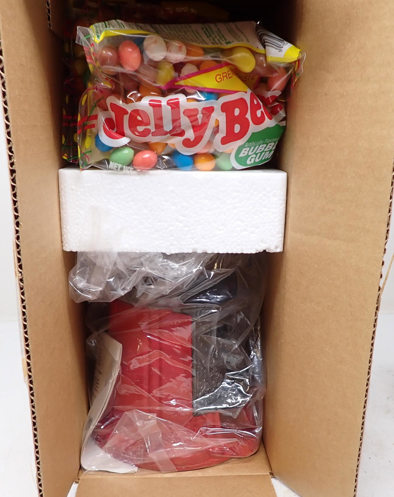 2 Rose Brand Gumball Machines: Hershey Broker written on globe. Approx 11 1/2" tall.