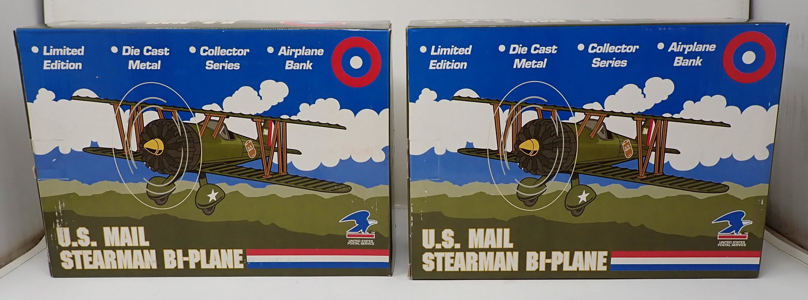 2 US Mail Stearman Bi-Planes: 2 Diecast Collector banks in original boxes.