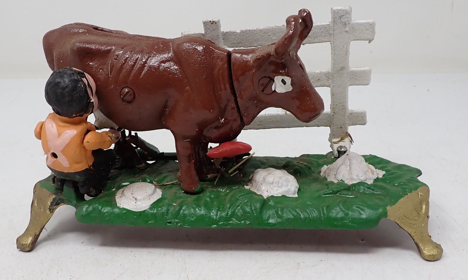 Cast Iron Milking Cow Mechanical Bank: Approx 9 1/2" long. Made in Taiwan