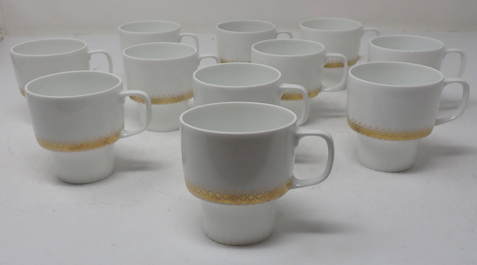 11 Rosenthal Cups: Approx 2 1/2" in diameter and 2 3/4" tall.