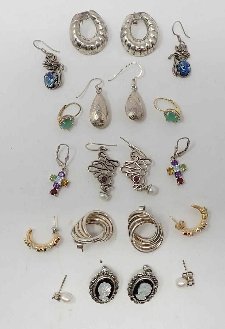 10 Pair of Sterling Earrings: Various styles and makes, includes cameo, hoops, crosses, various stones, etc. 1.72 ozt total.