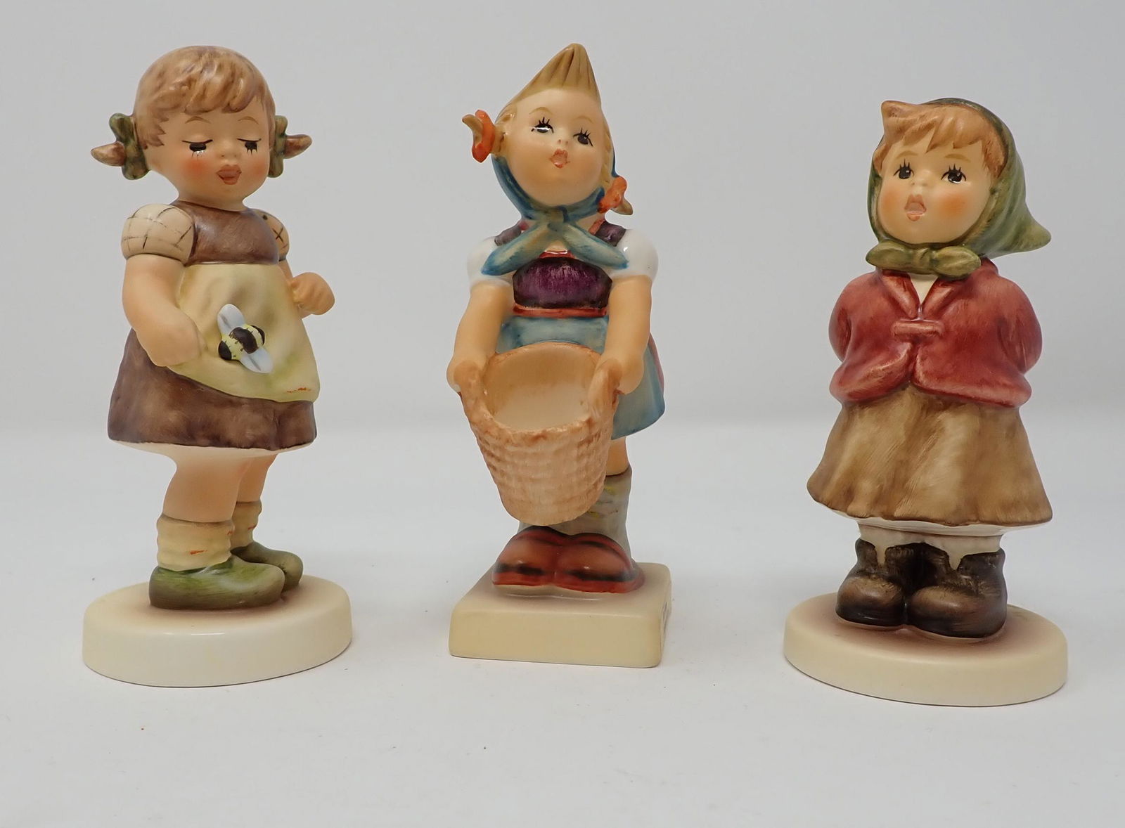 3 Hummel Goebels: Tallest is approx 4 3/8" tall