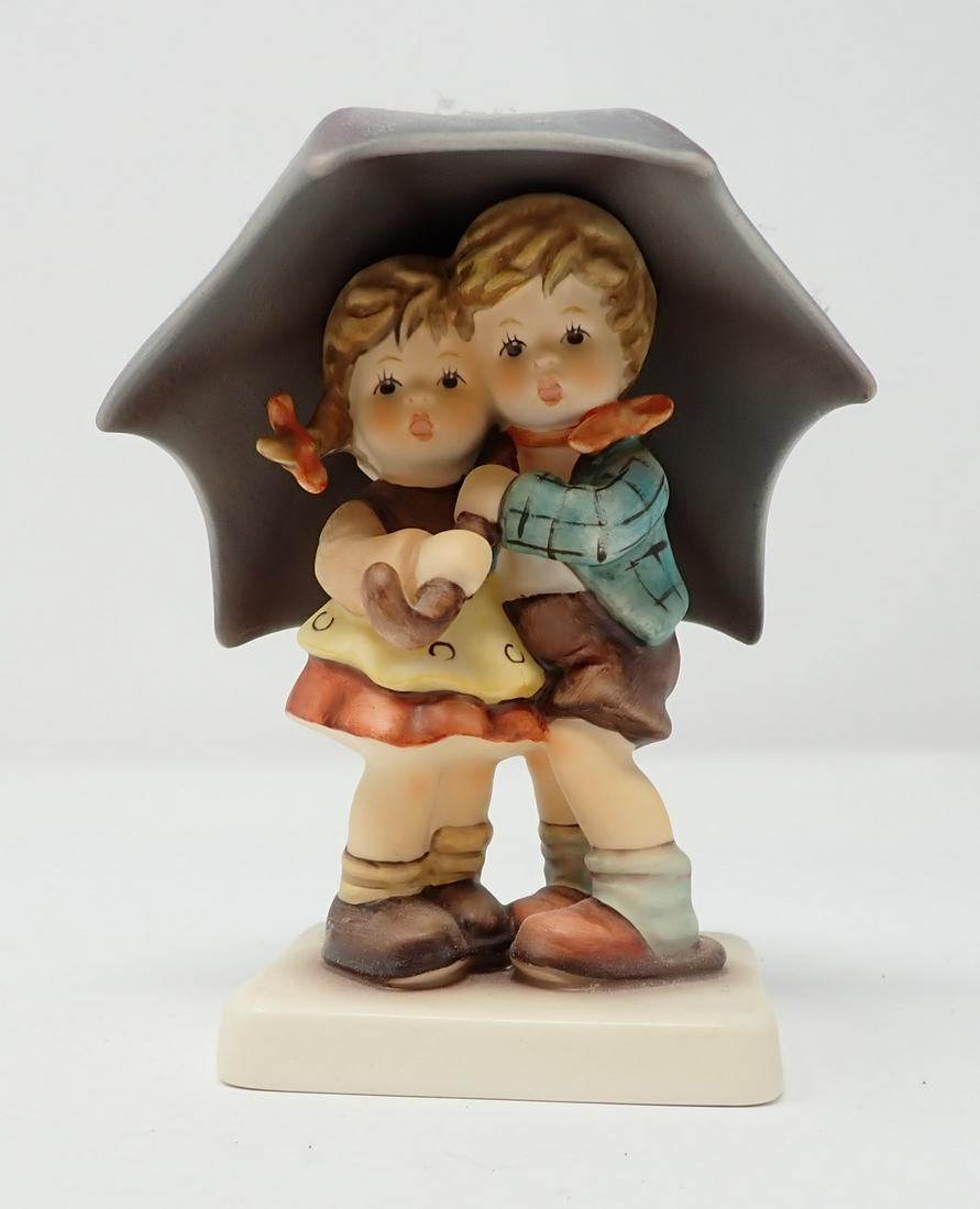 1990 Hummel Goebel Sunshower: #634 2/0. Approx 4 3/4" tall.