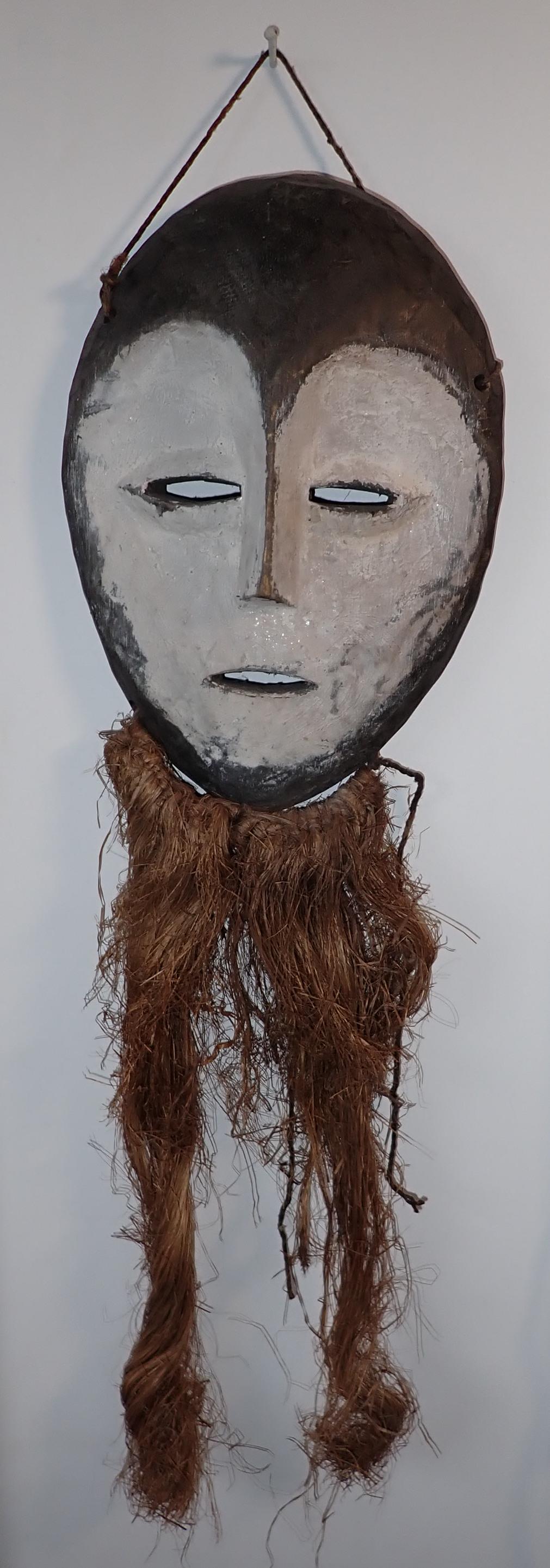 African Art Wood Mask: Wood mask is approx 6 3/4" x 9 1/2" . Total length is approx 23 1/2" .