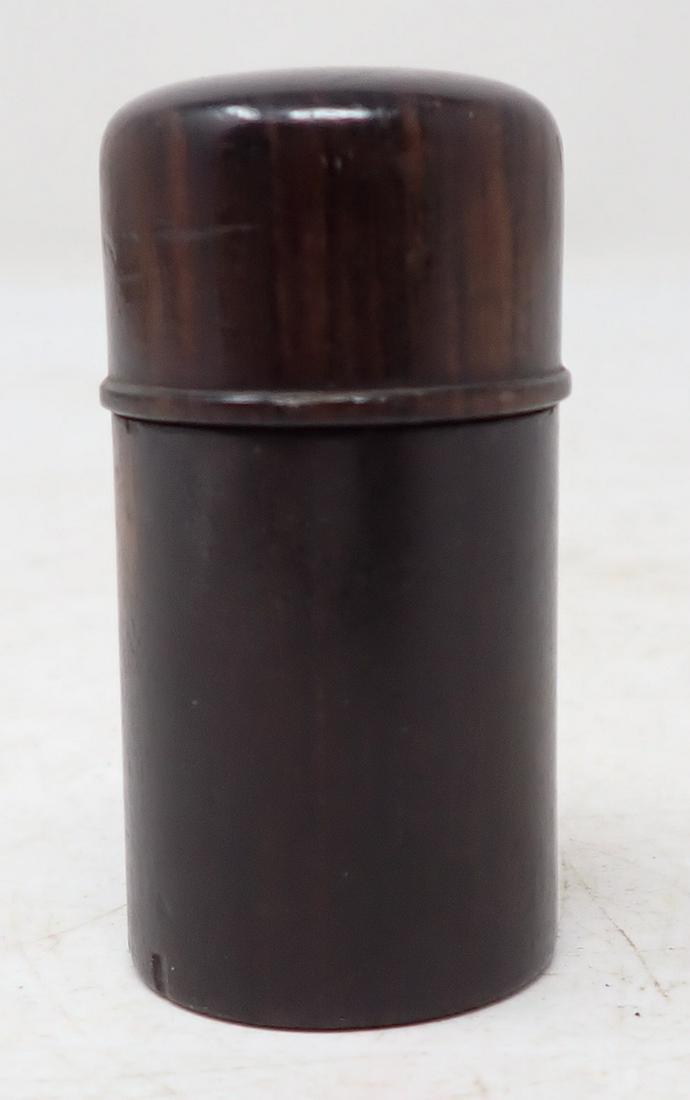 Bottle Encased in Wood: Approx 1 1/8" in diameter and 2 1/4" tall