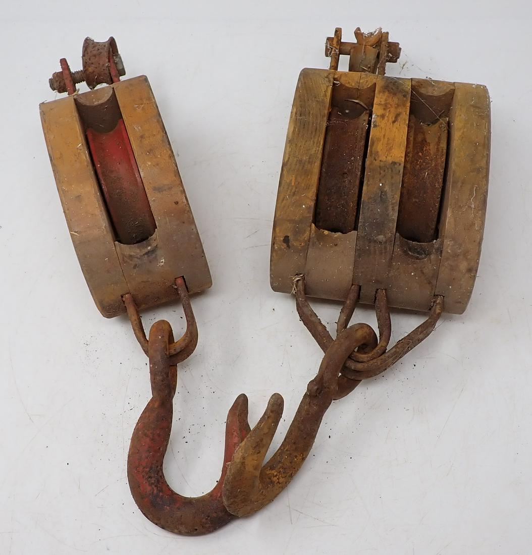 Wooden Pulleys: Largest is appro 5" wide and 15" total length