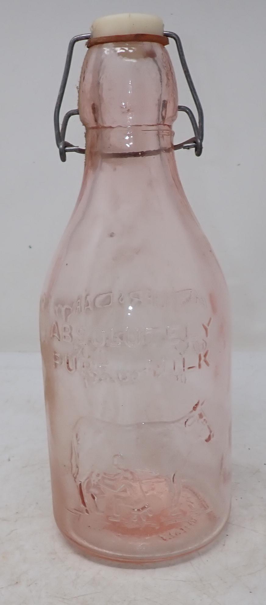 Thatchers Dairy Pink Milk Bottle: Repro bottle is approx 4" in diameter and 10 1/4" tall