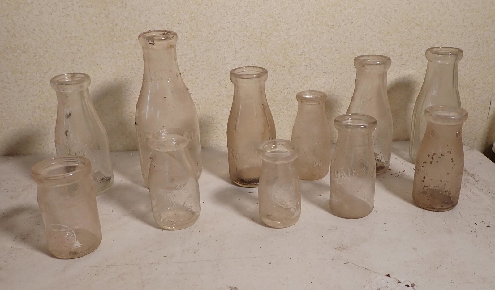 Milk Bottles: Gilmartin Southampton LI, Stephens Carbondale PA, Clinton Newark NJ, Alderney, Chestnut Farms, Bordens, Dairylea, Chambersburg Trenton NJ, Puritan, Lancaster Sanitary. The bottles in the last picture 